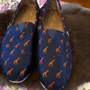 TOMS Navy Slip-Ons with Orange Giraffe Design
